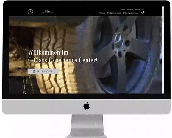 Desktop Monitor mit dem G-Class Experience Center. Zeigt alle Wahlmöglichkeiten mit Preisen und wie es gebucht werden kann.