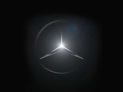 Leuchtender, silberner Mercedes-Benz Stern auf dunklem, fast schwarzem Hintergrund.