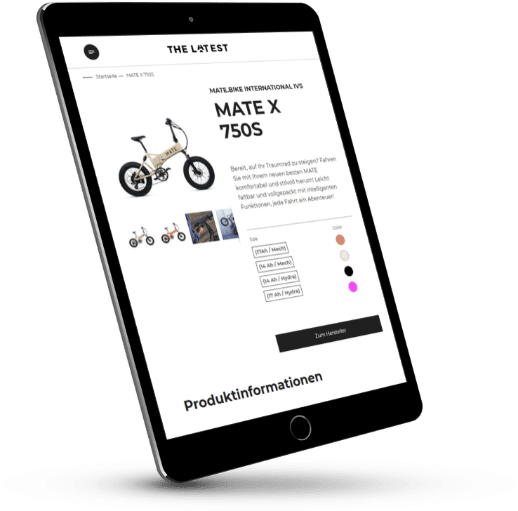 Ein schr&auml;g stehendes Tablet pr&auml;sentiert die Produktseite des E-Bikes &bdquo;MATE X 750S&ldquo; auf der Website von &bdquo;The Latest&ldquo;. Die Seite enth&auml;lt Fotos des faltbaren Rads, eine Farbauswahl und einen Button mit der Aufschrift &bdquo;Zum Hersteller&ldquo;. Darunter beginnt der Bereich f&uuml;r Produktinformationen.