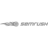 Semrush Logo: Ein grauer, dynamischer Schriftzug "SEMRUSH" mit einem stilisierten kometenartigen Symbol links daneben.